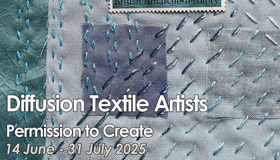 Textile with stitching and postal stamp in the centre
