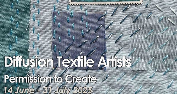Textile with stitching and postal stamp in the centre