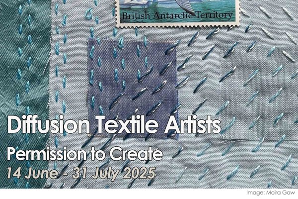 Textile with stitching and postal stamp in the centre