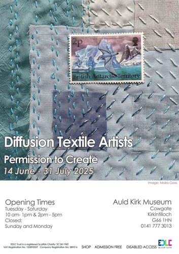 Textile with stitching and a postal stamp in the middle