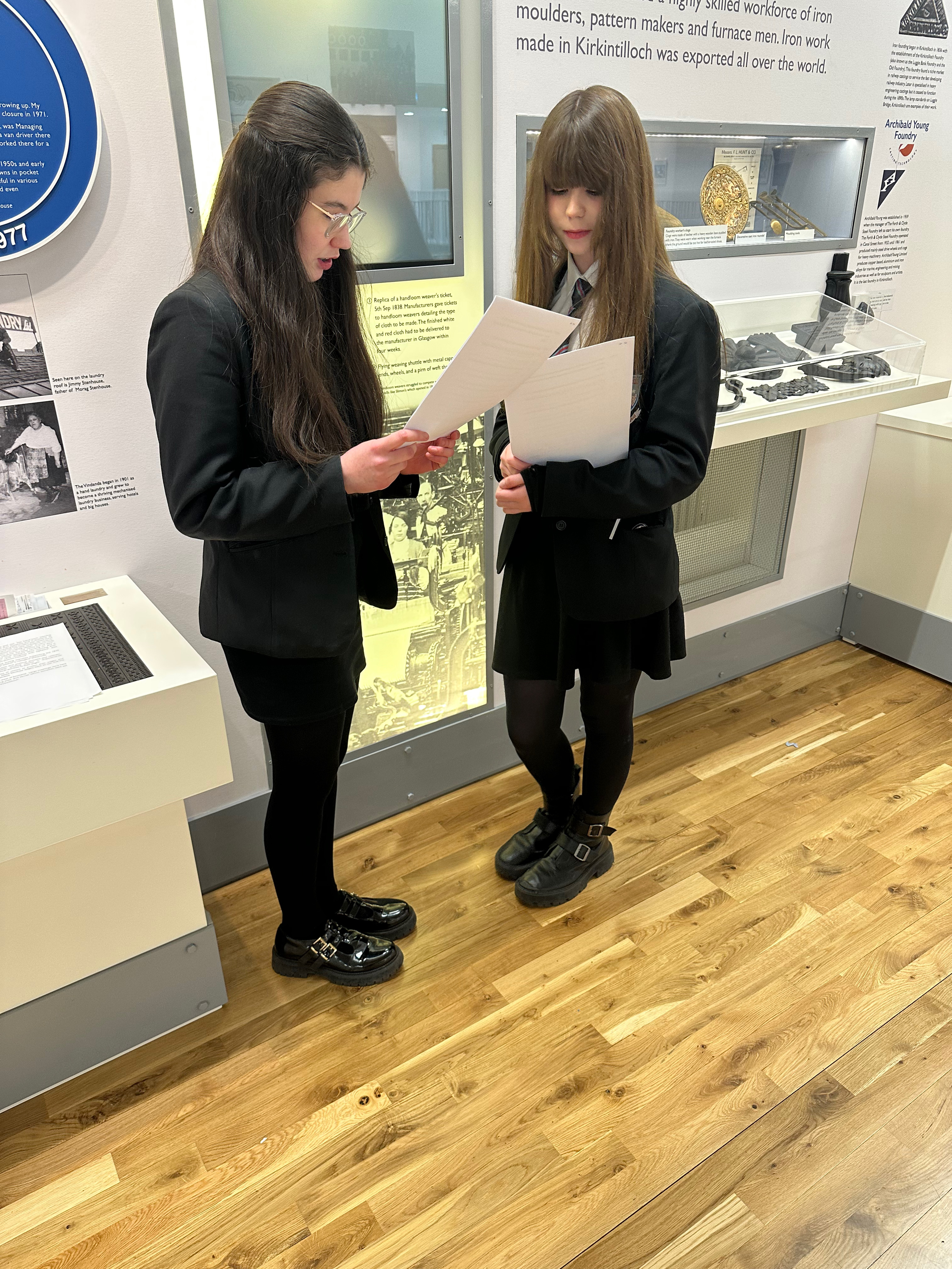 Two pupils rehearsing the handloom weaver’s script