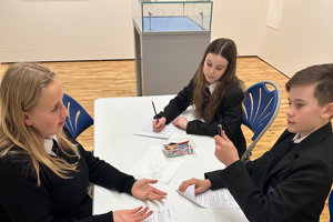group of pupils rehearsing script